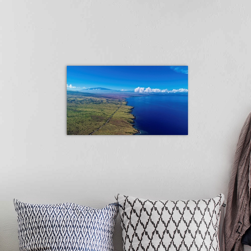 A bohemian room featuring Aerial photograph of the west shore of Kona Island, Hawaii