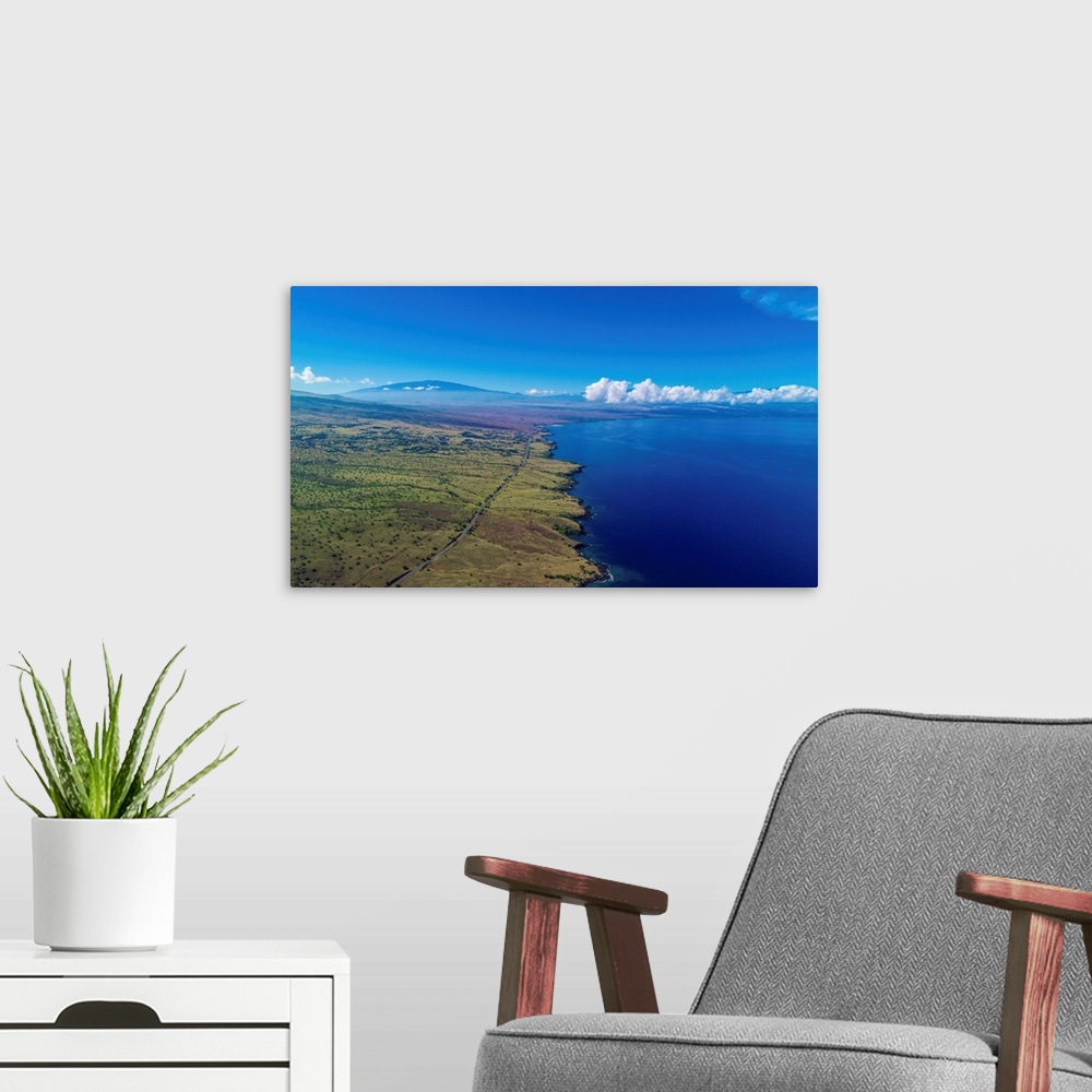 A modern room featuring Aerial photograph of the west shore of Kona Island, Hawaii