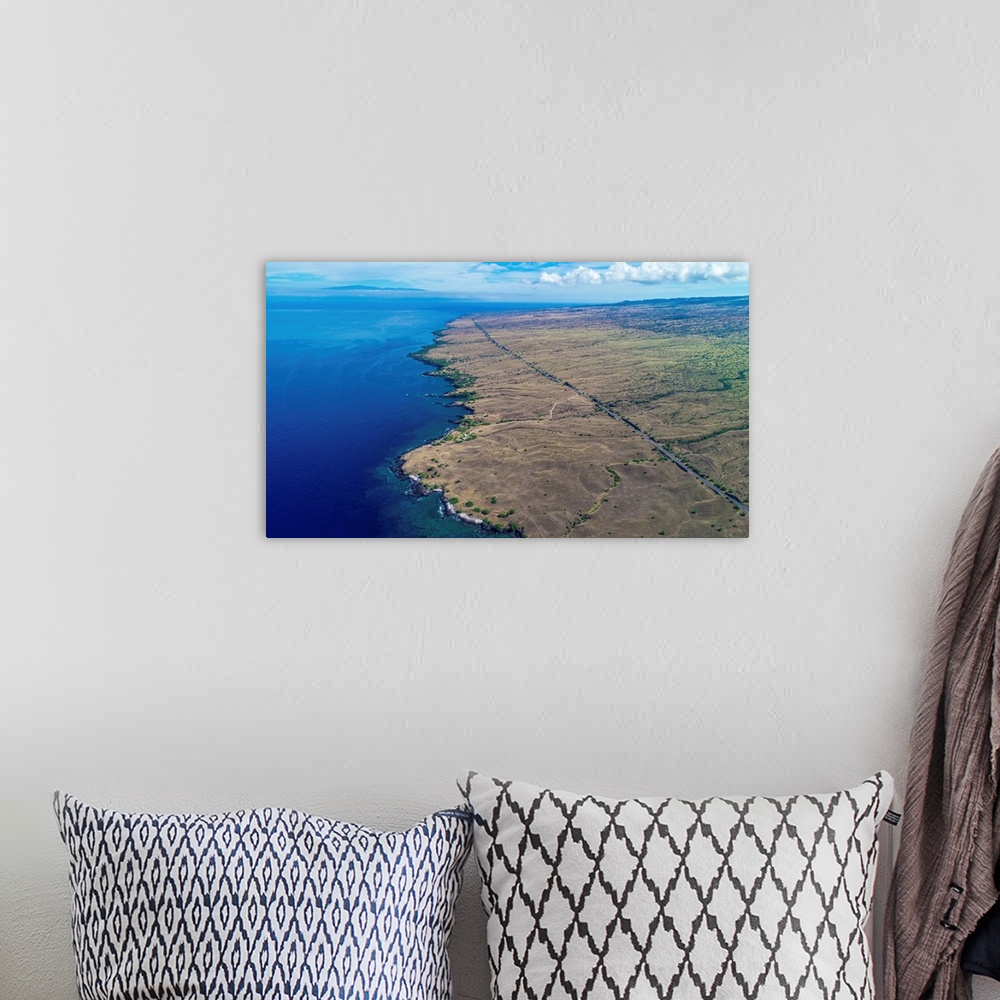 A bohemian room featuring Aerial photograph of the west shore of Kona Island, Hawaii