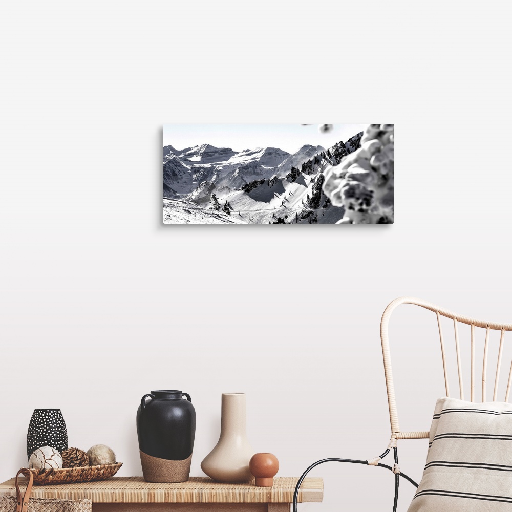 A farmhouse room featuring Black and white landscape photograph of the Wasatch Range in Utah with a skier hiking up in the m...