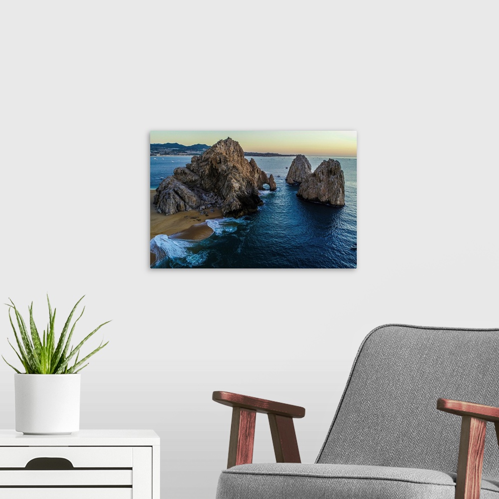 A modern room featuring Beautiful evening view of the Cabo arch