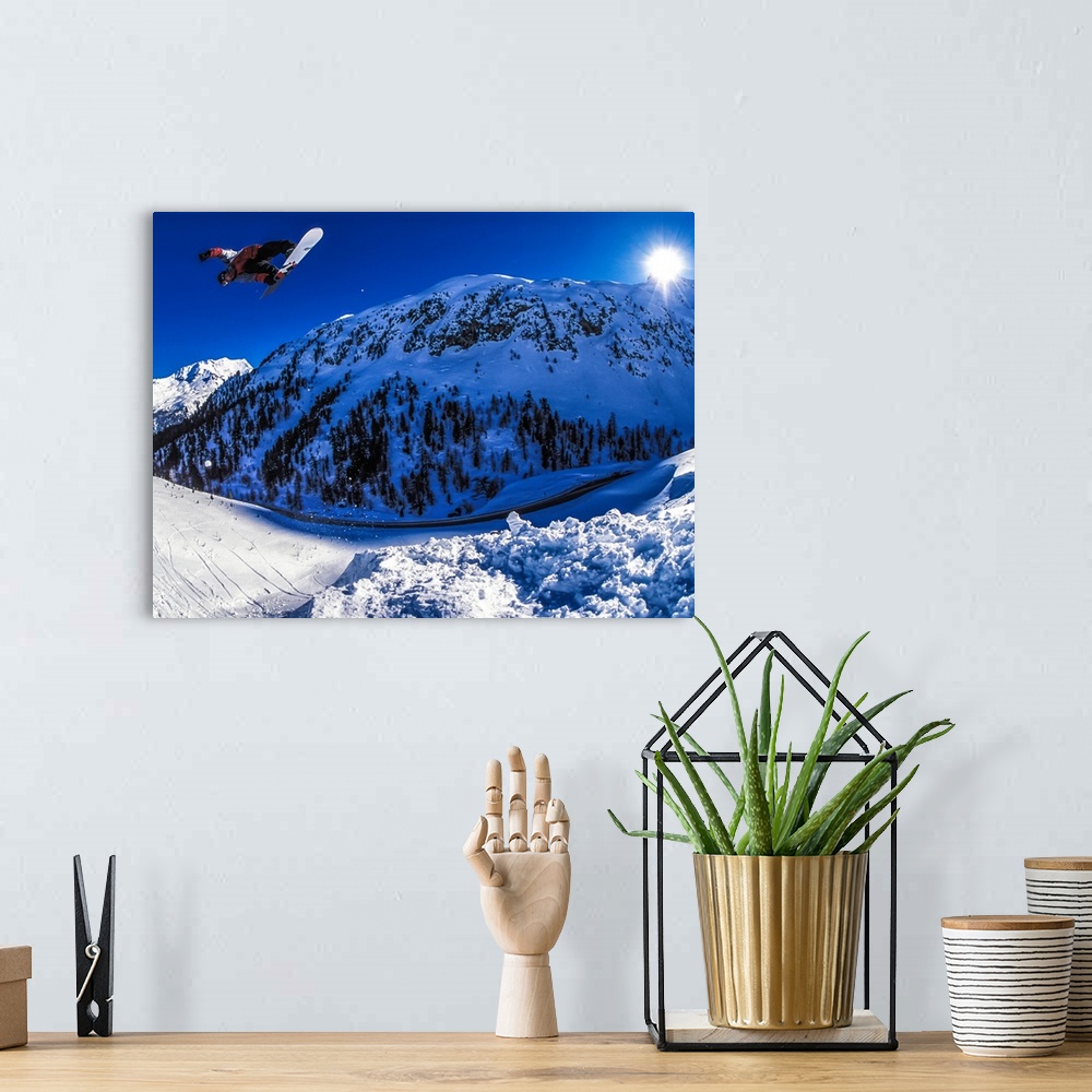 A bohemian room featuring Dave Aubrey flying over the Alps in Julier Pass, Switzerland.