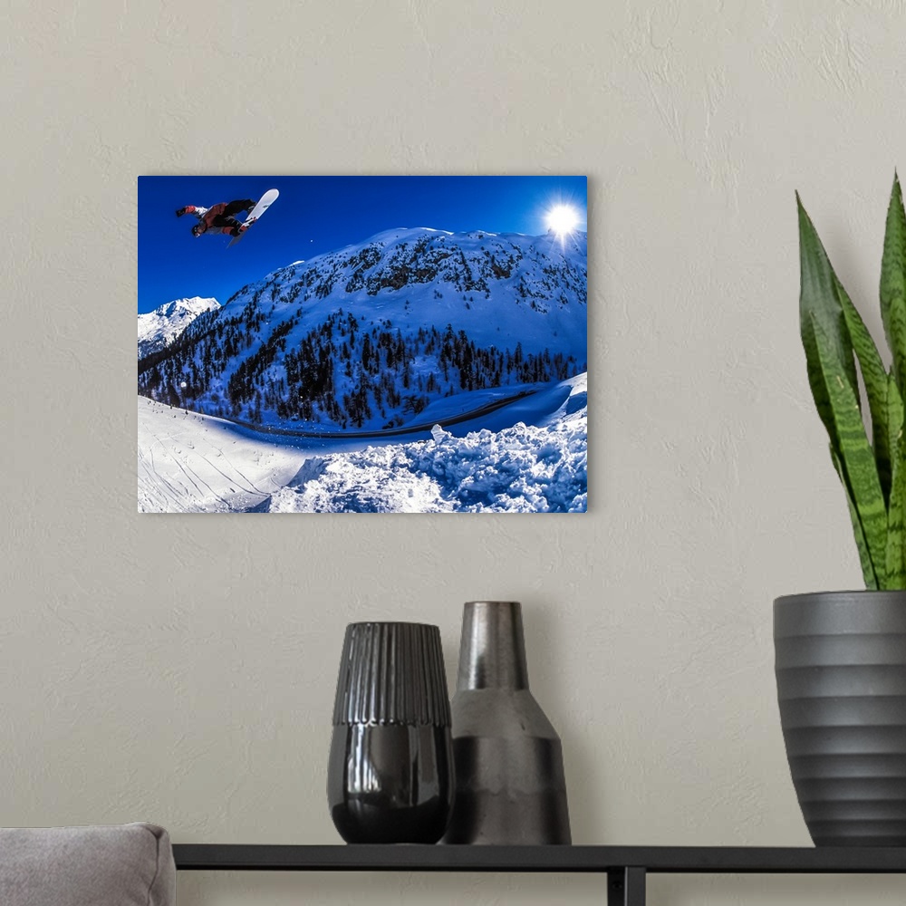 A modern room featuring Dave Aubrey flying over the Alps in Julier Pass, Switzerland.