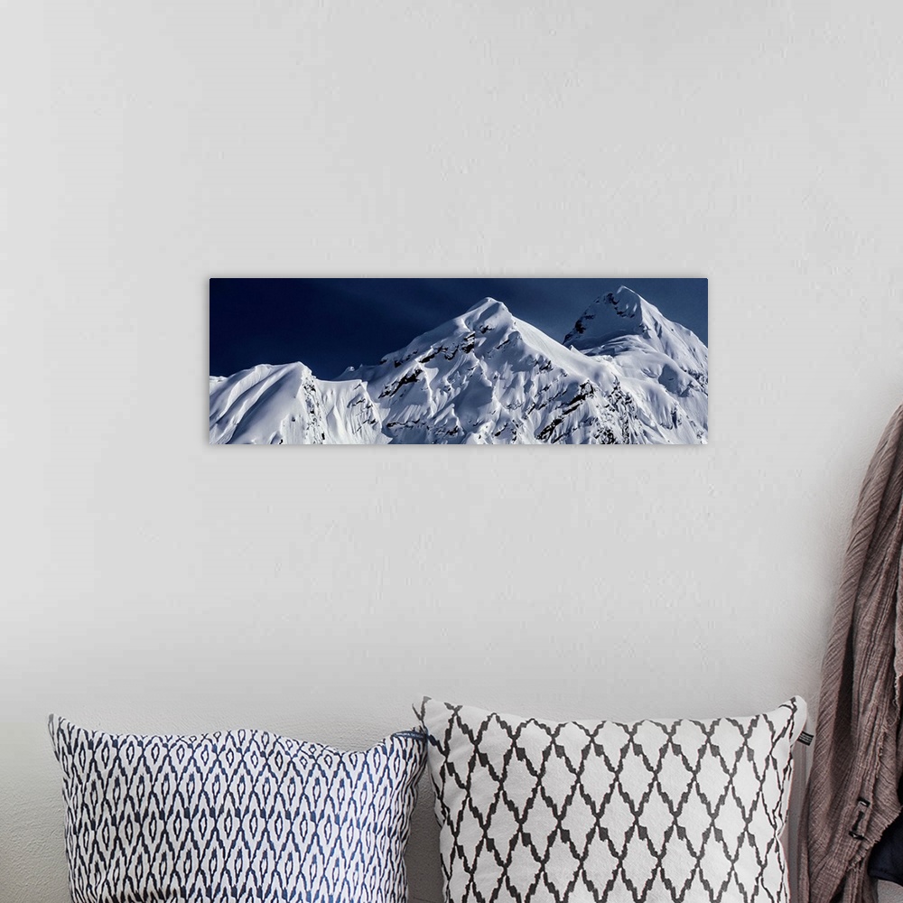 A bohemian room featuring Snow-covered mountains of Pontoon Peak in the Chugach Range in Alaska.
