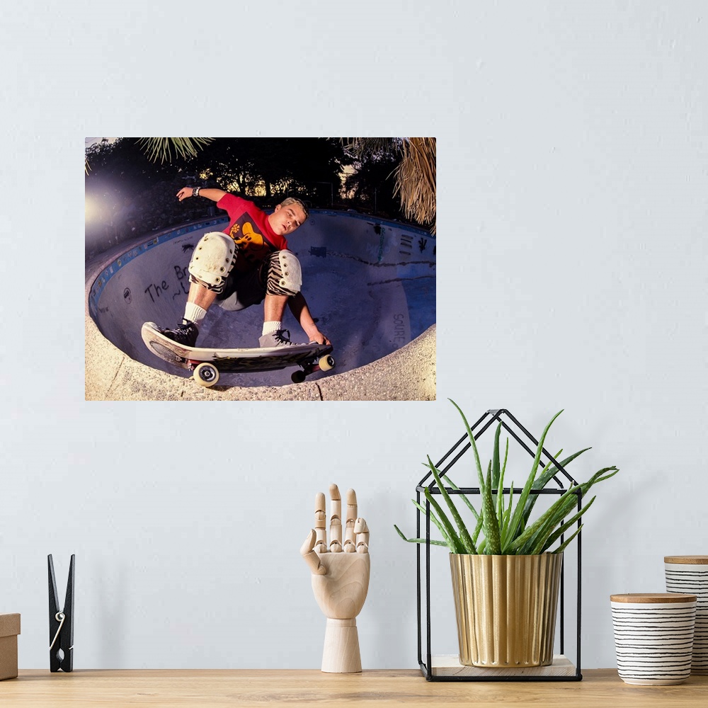 A bohemian room featuring Riky Barnes skateboarding at San Juan Capistrano Skatepark in California, 1989.