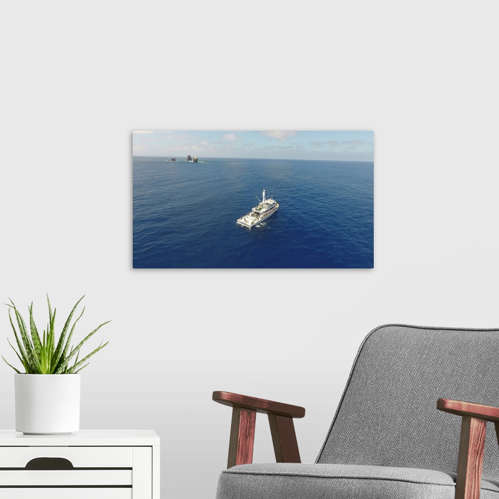 A modern room featuring The Excel fishing boat searching for tuna near the Alijos Rocks, Mexico