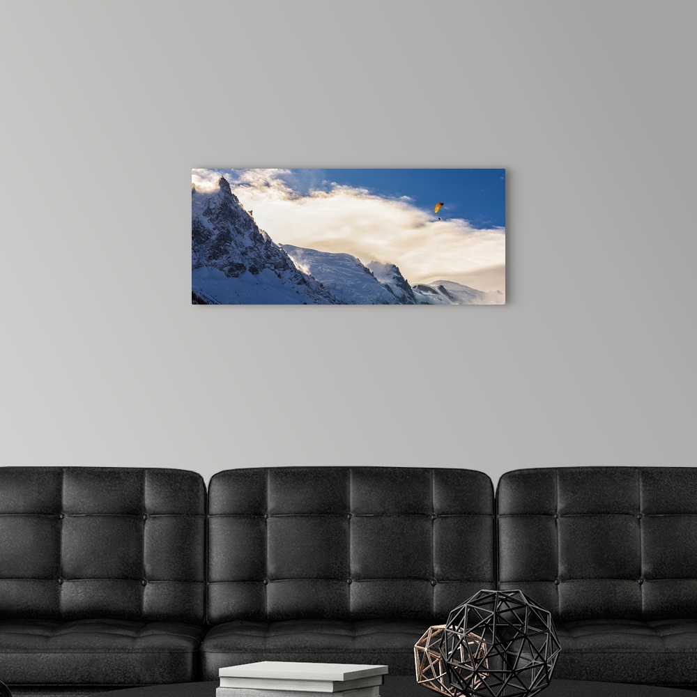 A modern room featuring Photograph of Mont Blanc with a parachuter enjoying the views