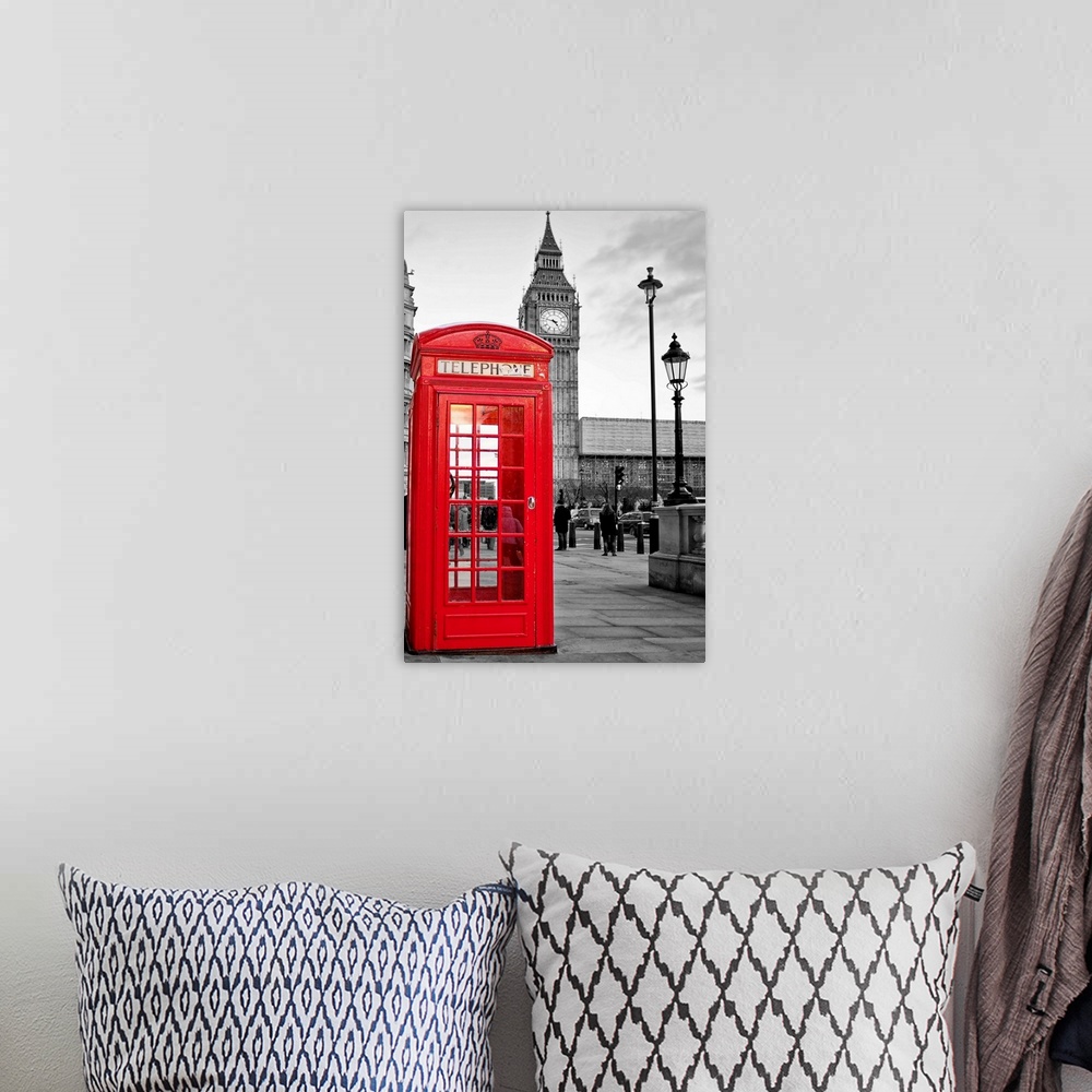 A bohemian room featuring A  traditional red phone booth in London with the Big Ben in a black and white background