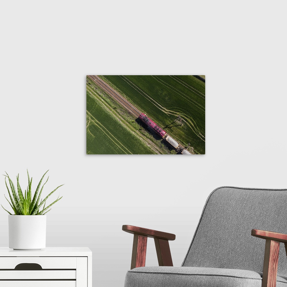 A modern room featuring Aerial View Of A Train On The Railway Track In Poland