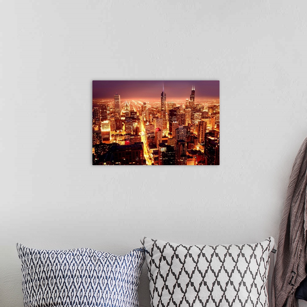 A bohemian room featuring City of Chicago. Aerial view of Chicago downtown at nigh from high above.
