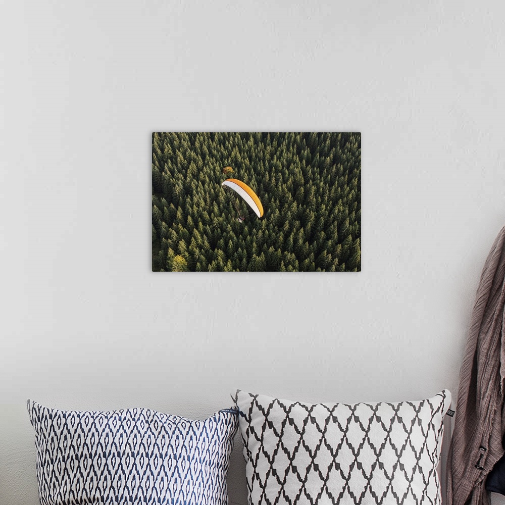 A bohemian room featuring Aerial View Of Paramotor Flying Over The Forest In Poland