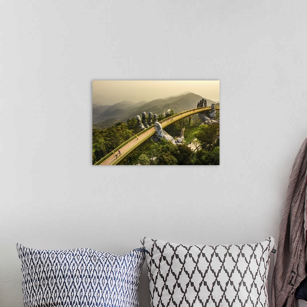 A bohemian room featuring Aerial View Of The Golden Bridge Lifted By Two Giant Hands, Ba Na Hill, Da Nang, Vietnam