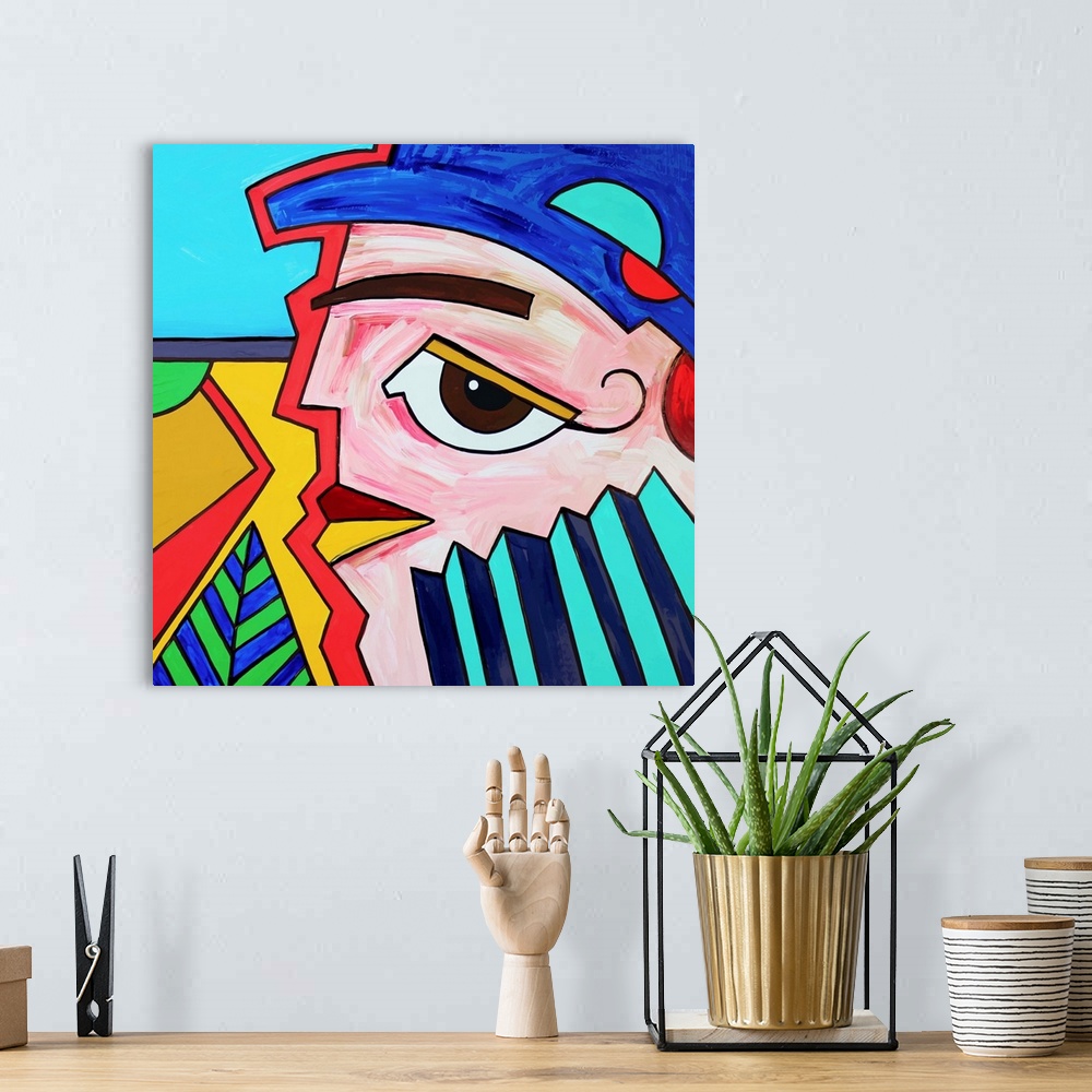A bohemian room featuring Unusual original abstract art composition of man face profile.