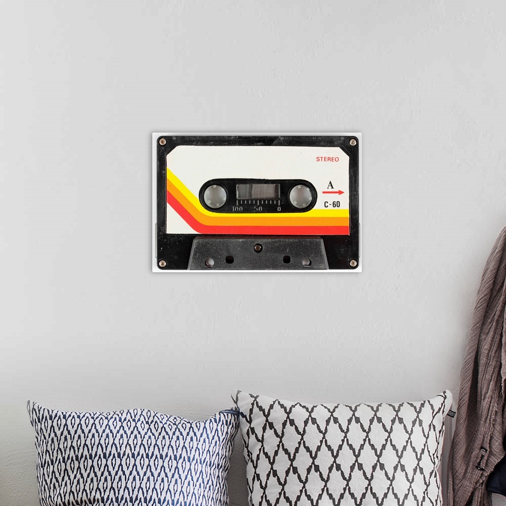A bohemian room featuring an old audio cassette