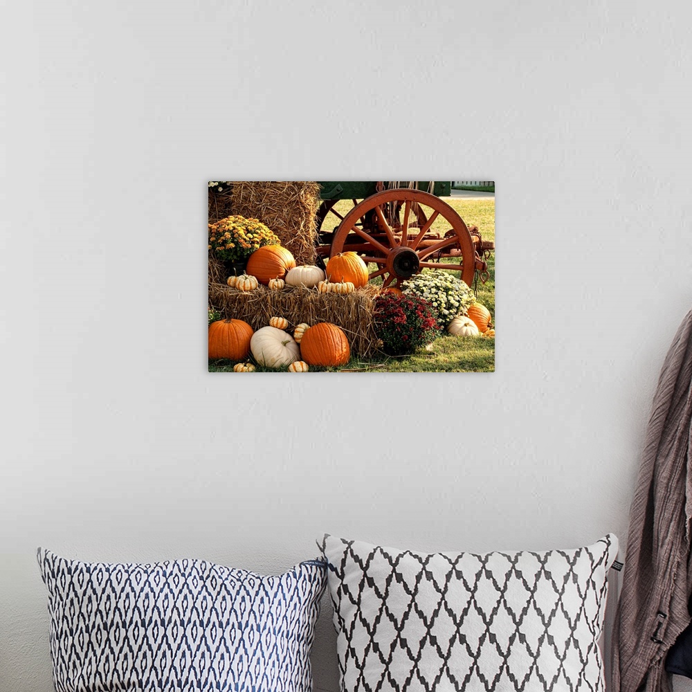 A bohemian room featuring Autumn Pumpkins and Mum Display.