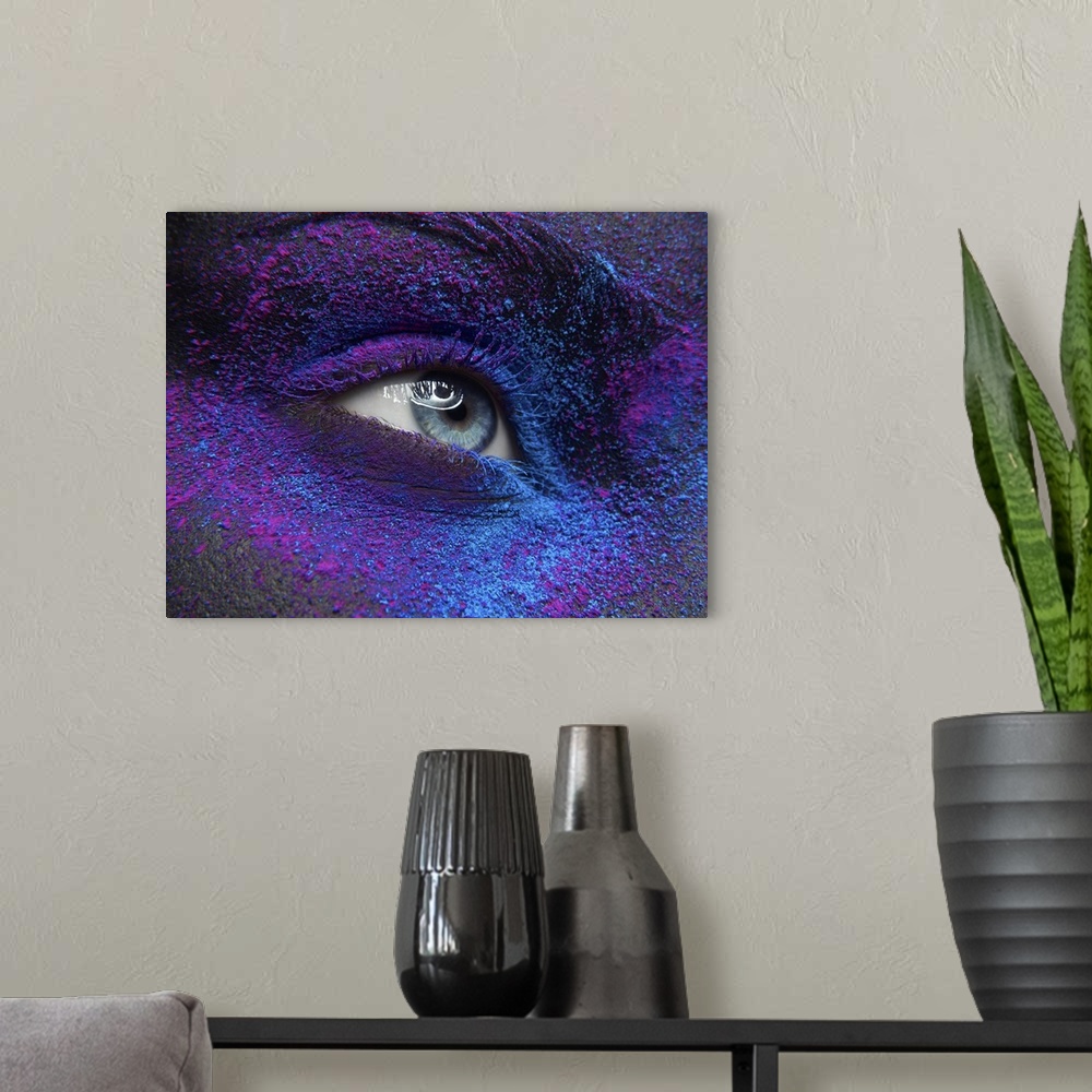 A modern room featuring Beautiful Female Eye With Dry Paint Dust Pigment On Face