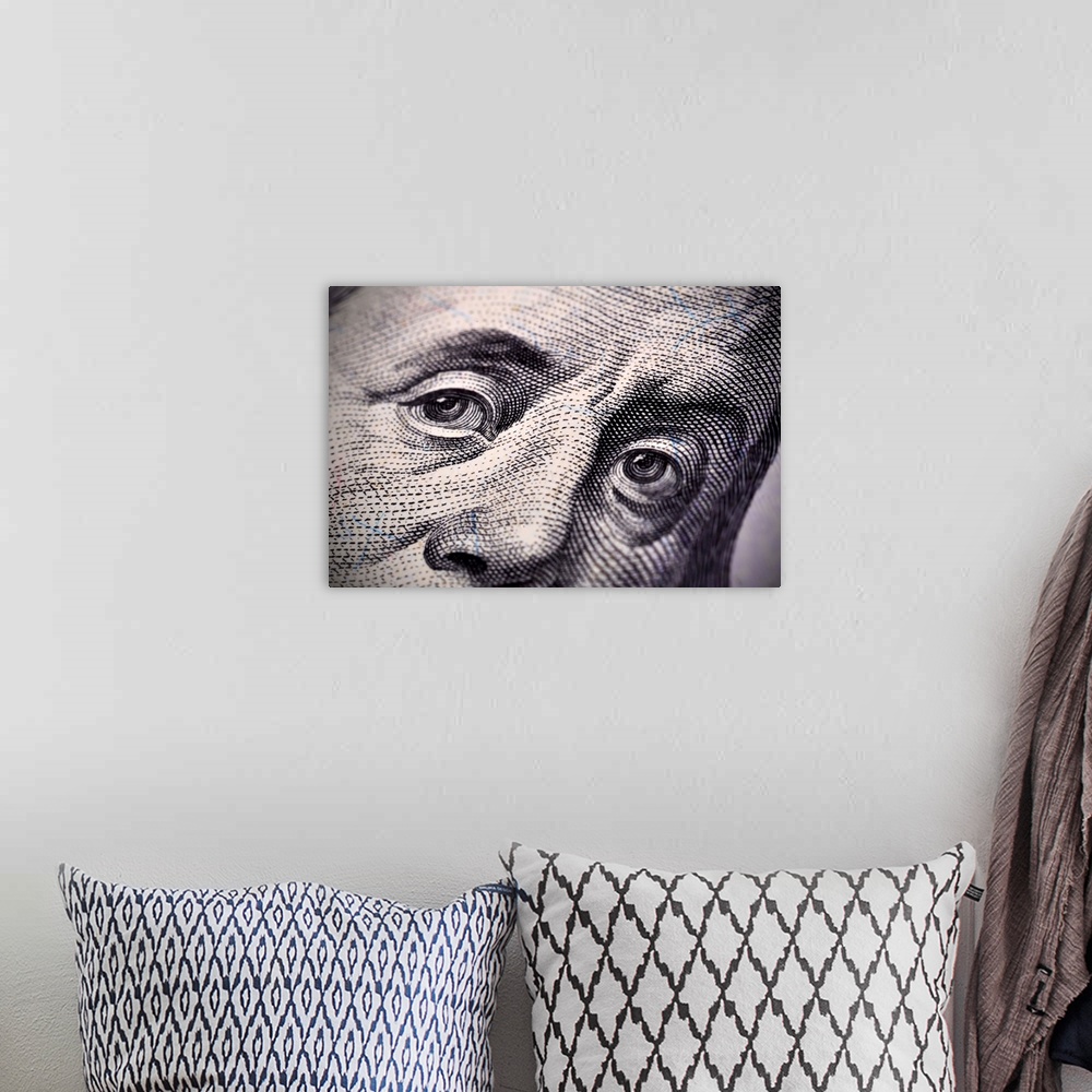 A bohemian room featuring Benjamin Franklin face on the US $100 dollar bill. Extra close up
