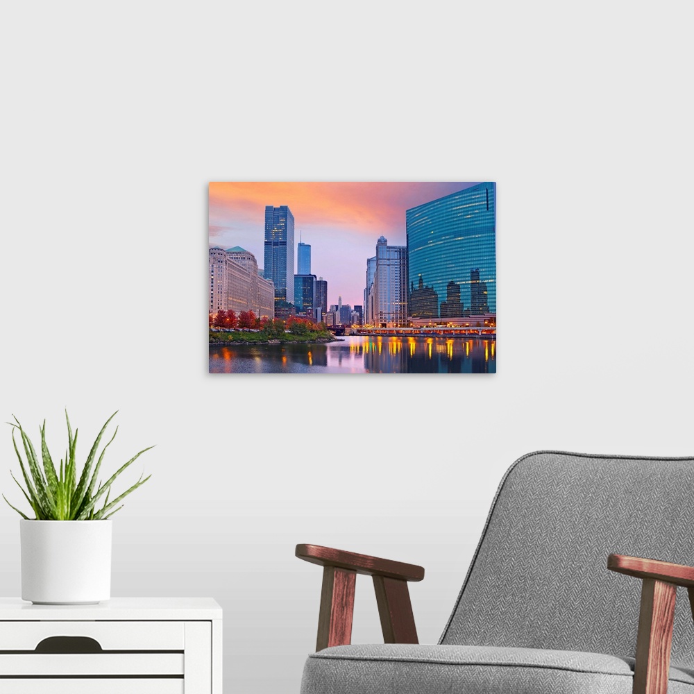 A modern room featuring Image of the city of Chicago during sunset.