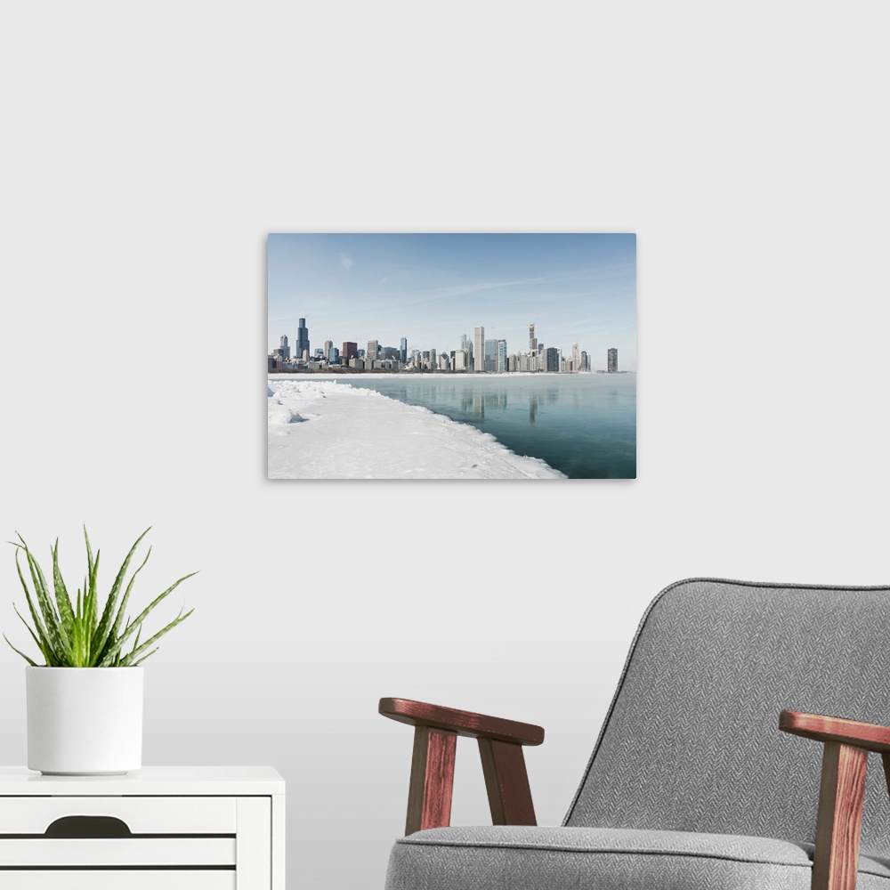 A modern room featuring Chicago Downtown Panorama In Winter, Frozen Lake With Snow Covers Lake Michigan