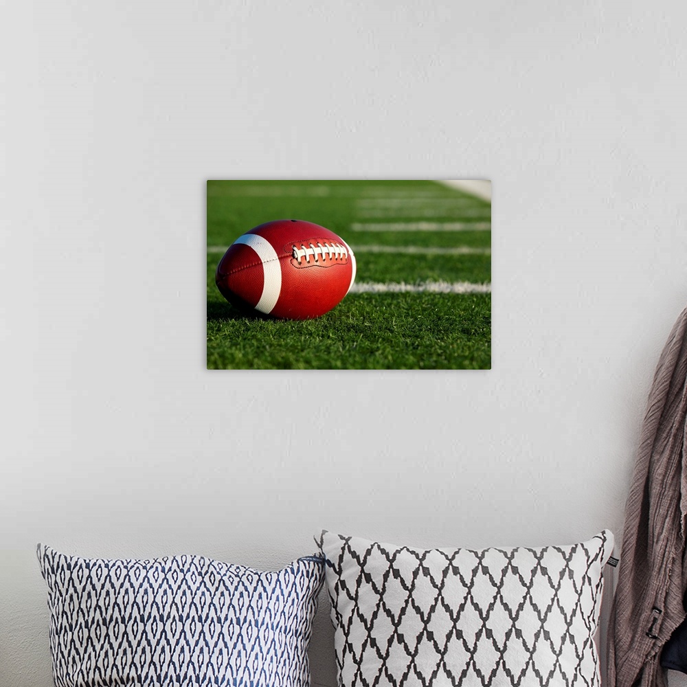 A bohemian room featuring Collegiate Football on the Field.