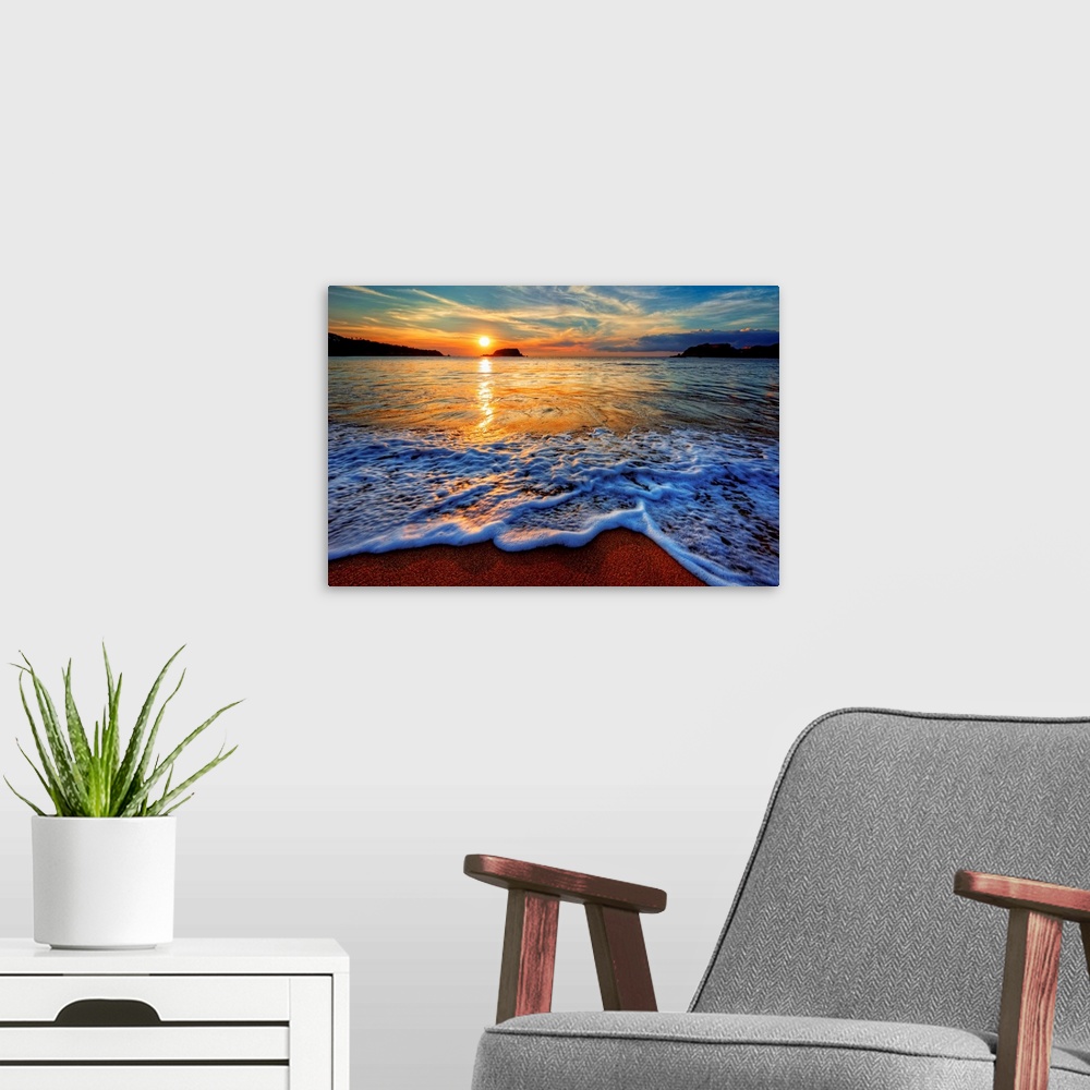 A modern room featuring Ocean bay sunrise with distant black cliffs, Bahamas.