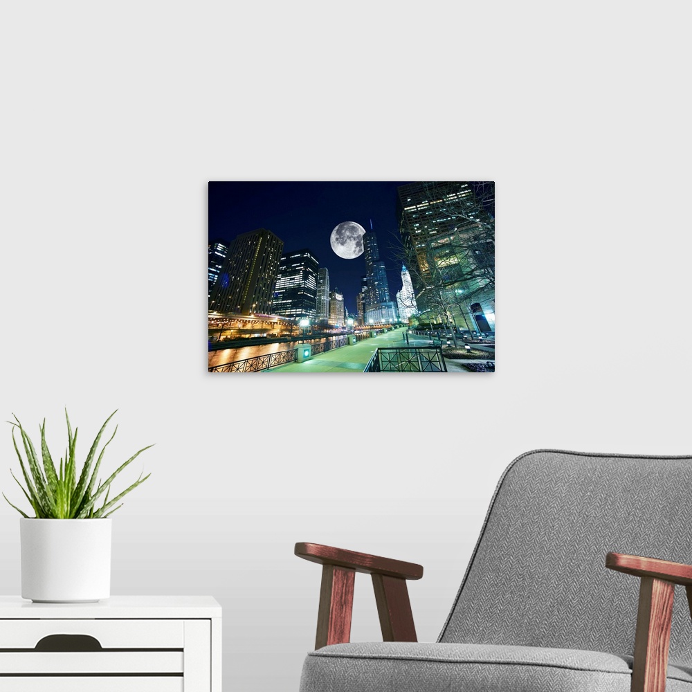 A modern room featuring Chicago at Night. Shot Taken from Chicago Famous Riverwalk. Large Moon on the Sky.
