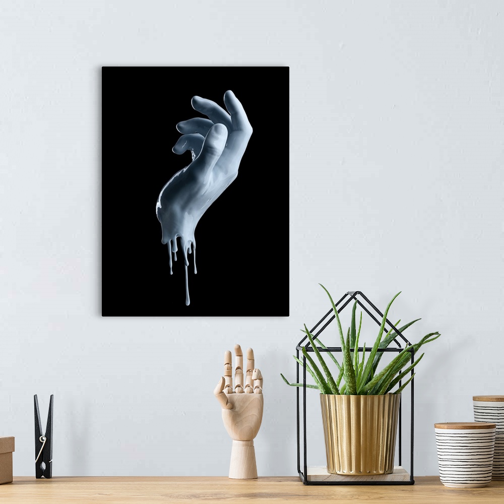 A bohemian room featuring Elegant Female Hand On A Light Blue Paint Isolated On A Black Background