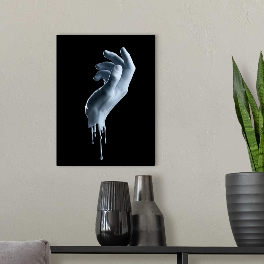 A modern room featuring Elegant Female Hand On A Light Blue Paint Isolated On A Black Background