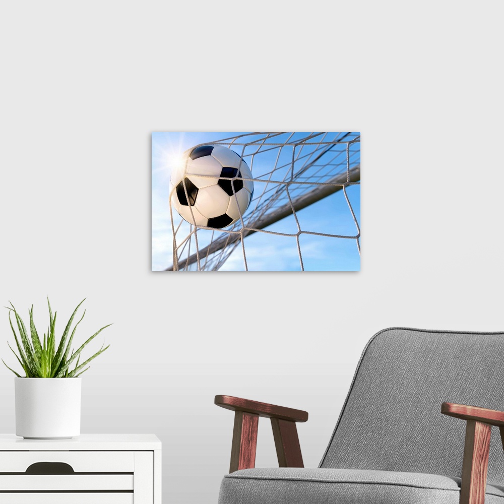 A modern room featuring Football Goal, With Sun And Blue Sky.