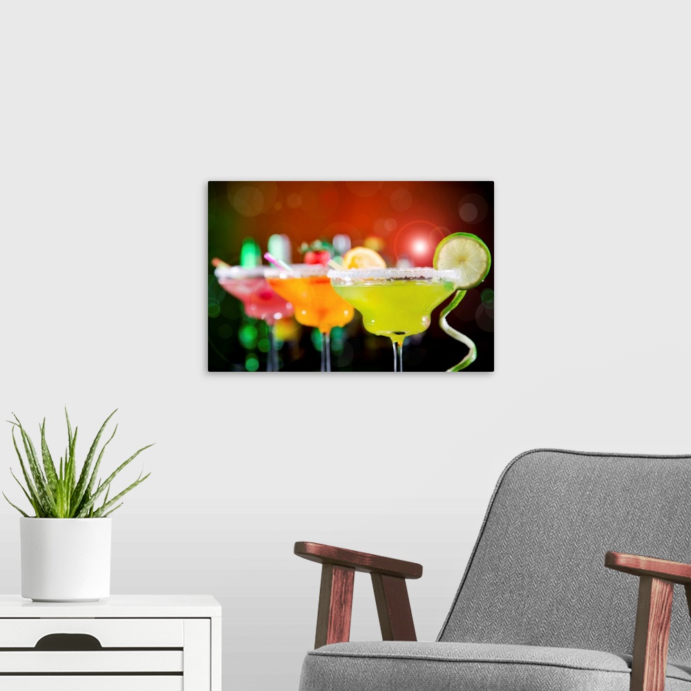 A modern room featuring Fruit cocktails on black background