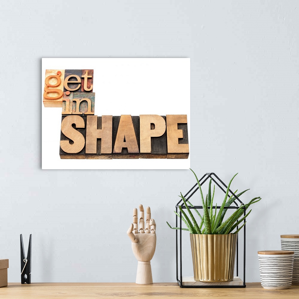 A bohemian room featuring get in shape - fitness concept - isolated text  in vintage letterpress wood type