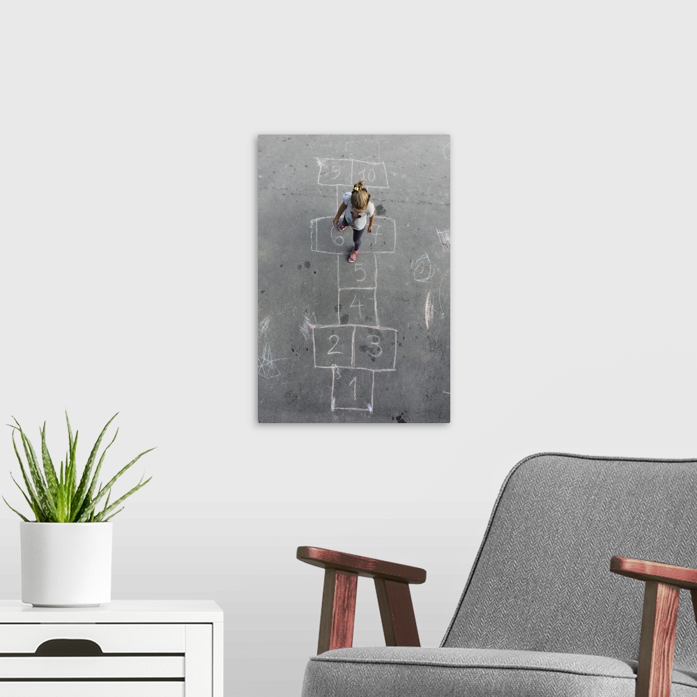 A modern room featuring Girl On The Hopscotch