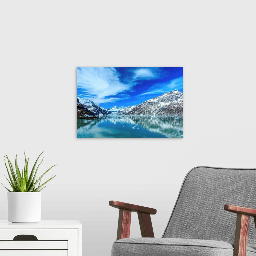 A modern room featuring Panoramic view of Glacier Bay national Park. John Hopkins Glacier with Mount Orville and Mount Wi...