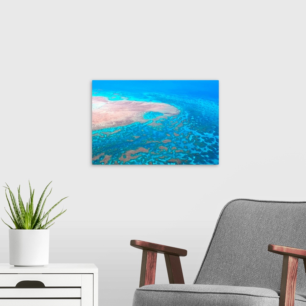 A modern room featuring Great Barrier Reef, Cairns Australia, seen from above.