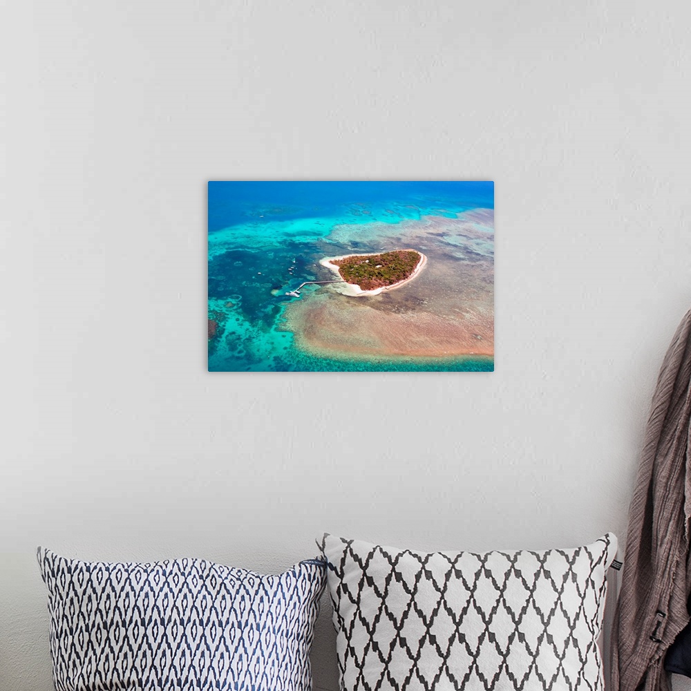 A bohemian room featuring Green Island, Great Barrier Reef, Cairns Australia seen from above.