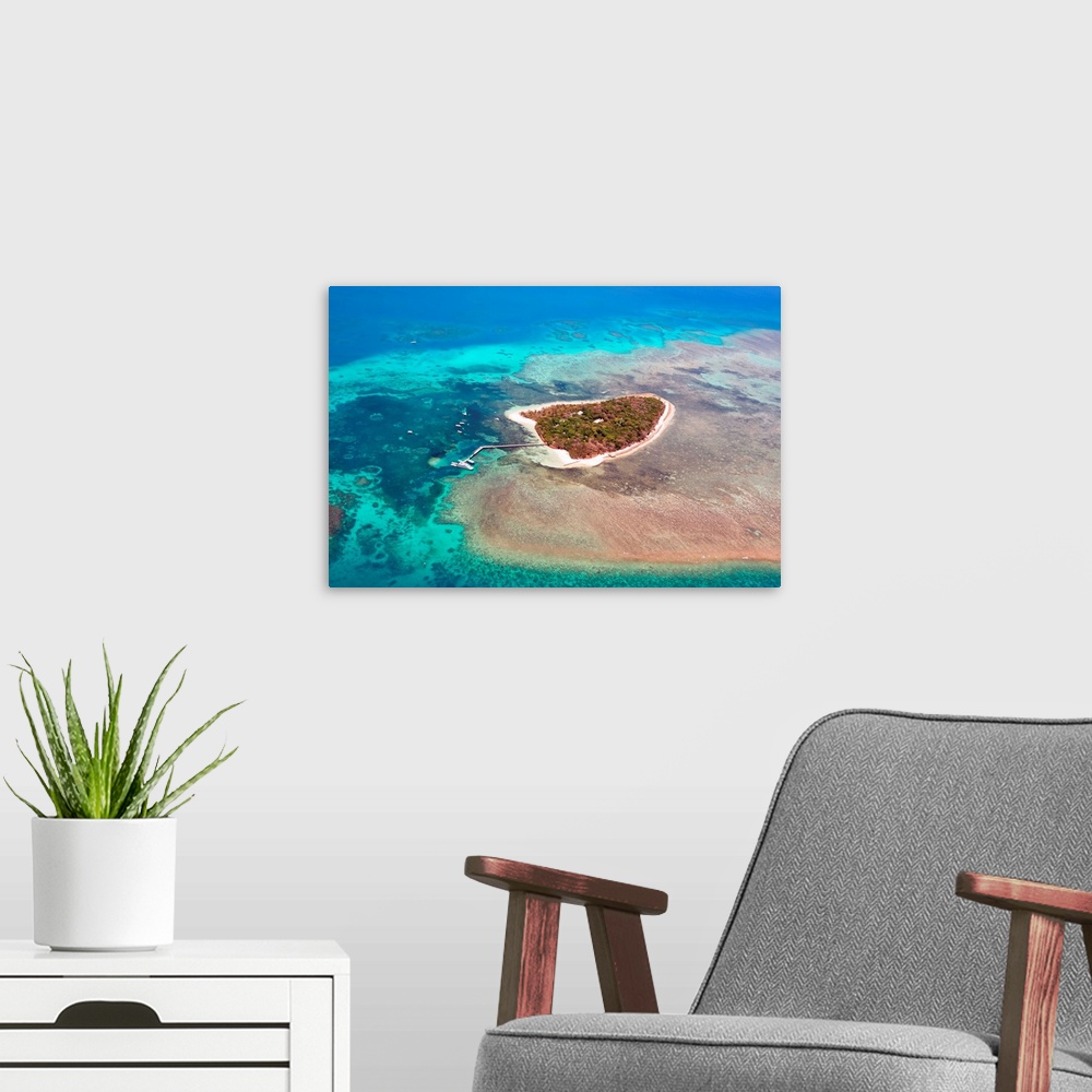 A modern room featuring Green Island, Great Barrier Reef, Cairns Australia seen from above.