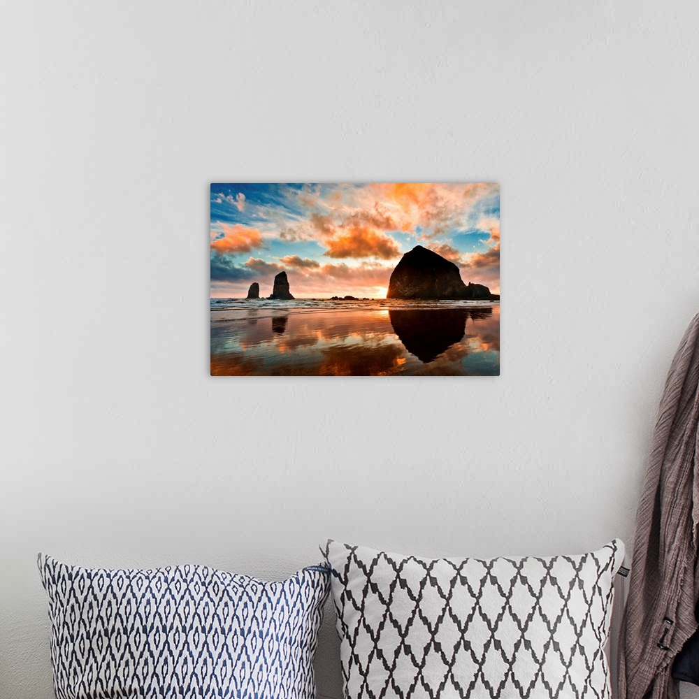 A bohemian room featuring Haystack Rock at sunset, Cannon Beach, Oregon.