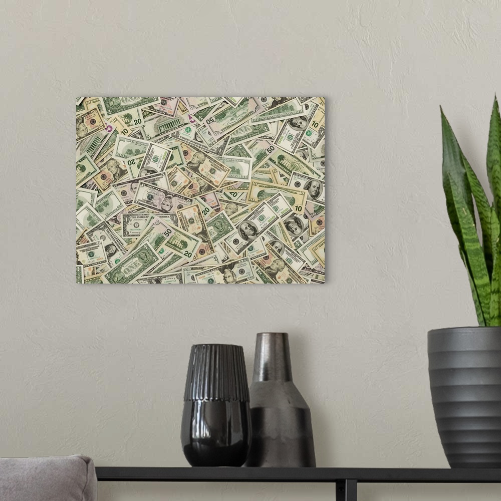 A modern room featuring Tons of hundred dollar bills scattered everywhere.