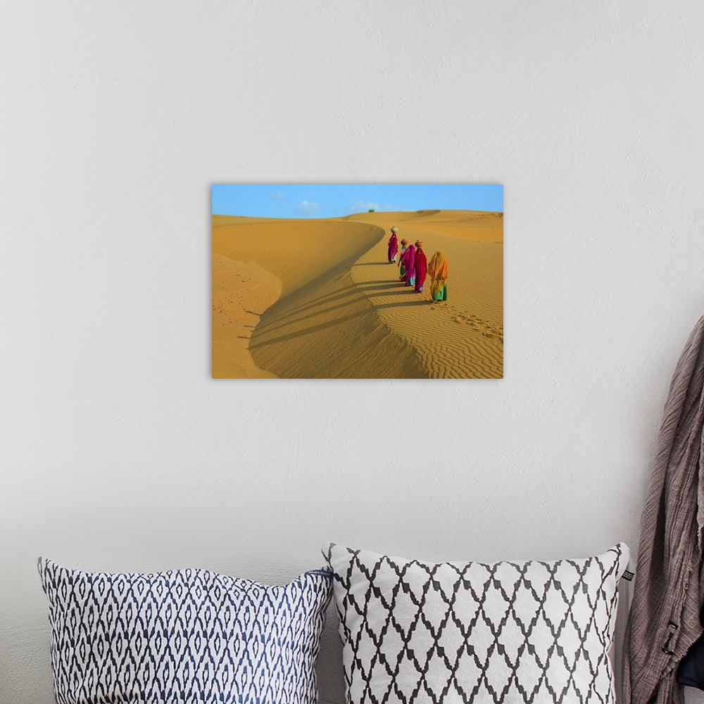 A bohemian room featuring Indian Women Carrying Jugs Of Water In Desert, Jaisalmer, Rajasthan, India
