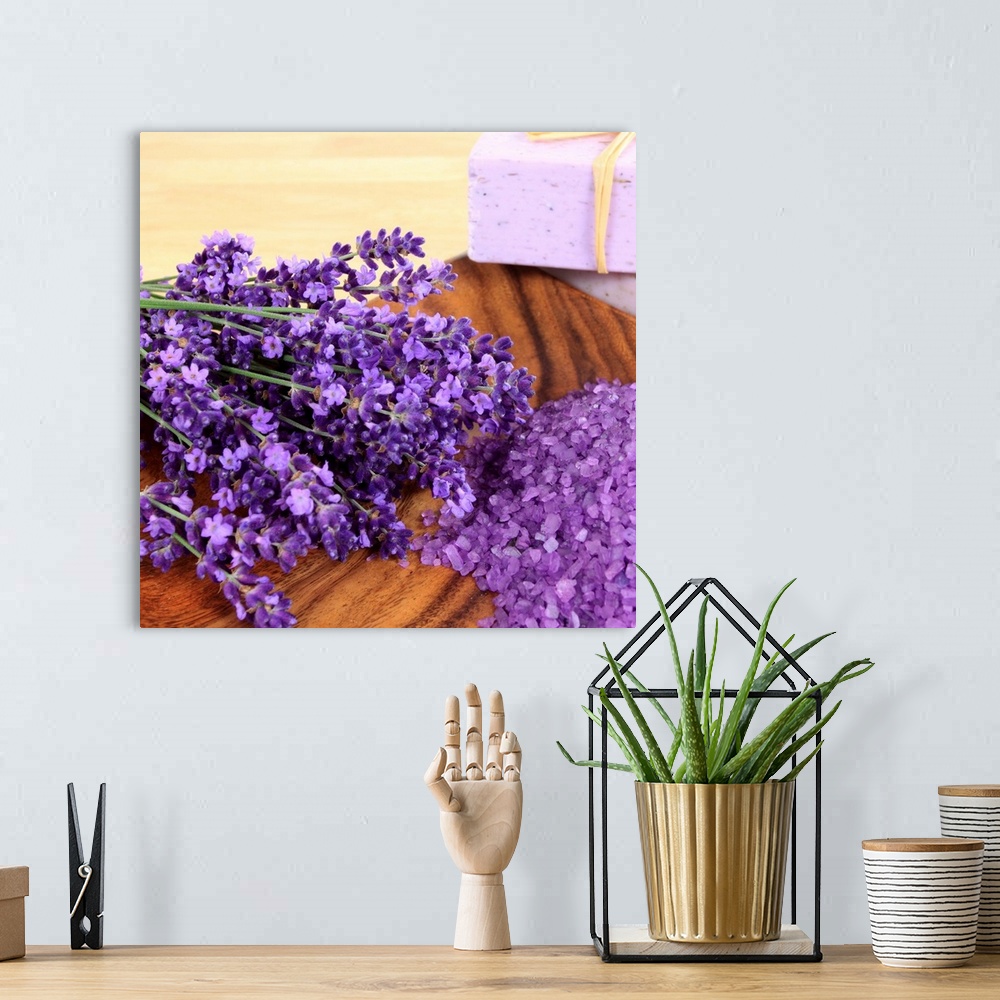 A bohemian room featuring Lavender laying on a wooden surface.
