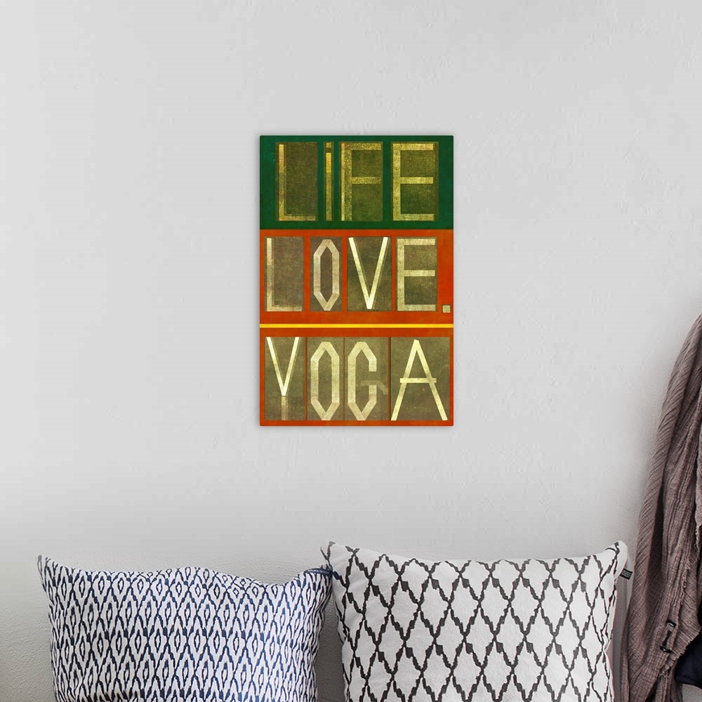 A bohemian room featuring Earthy background image and design element depicting the words "Life Love Yoga"