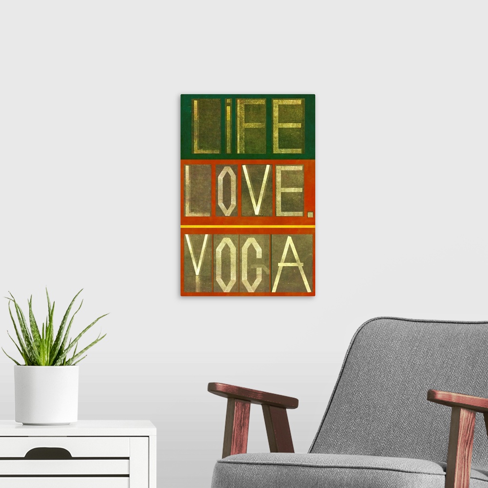 A modern room featuring Earthy background image and design element depicting the words "Life Love Yoga"