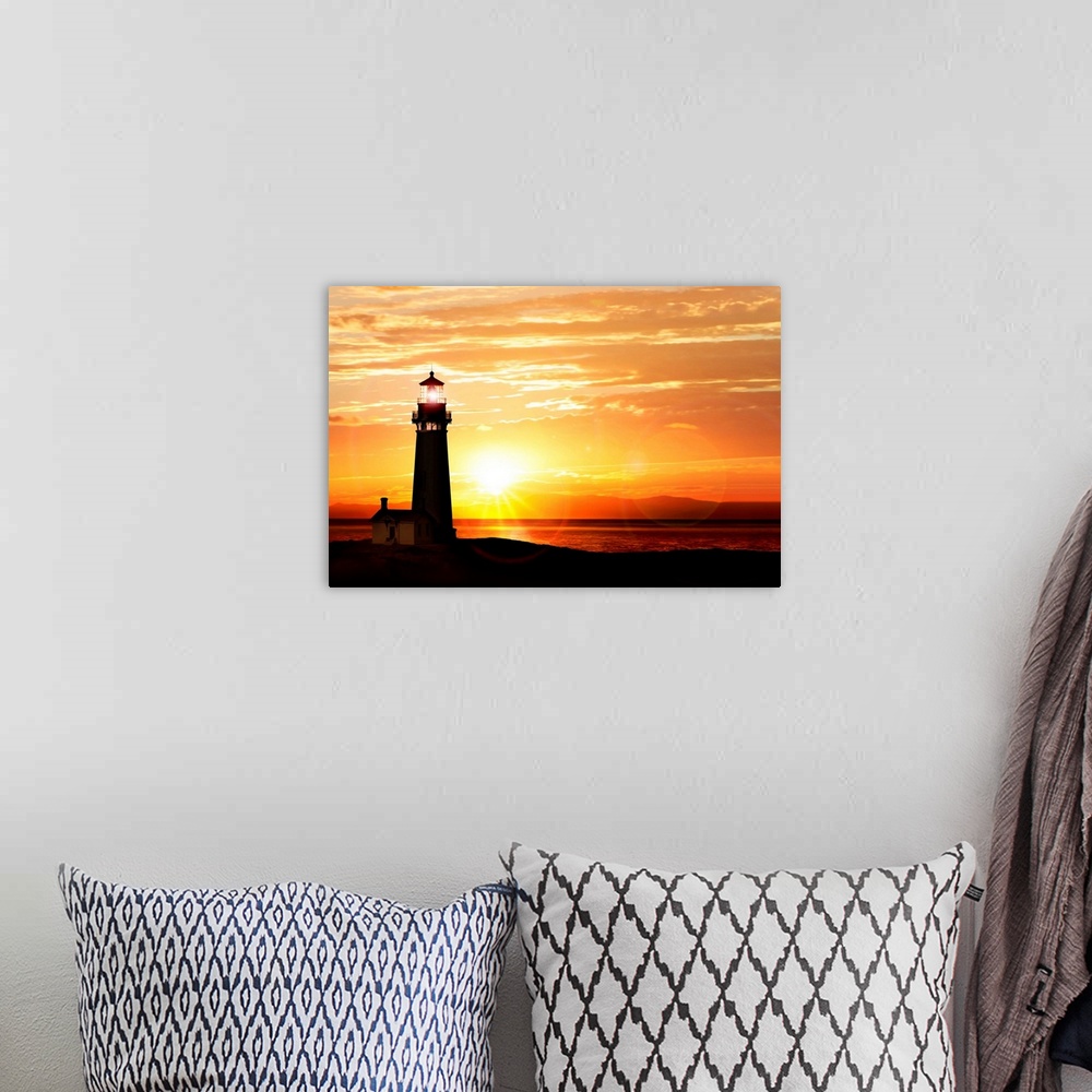 A bohemian room featuring Lighthouse near ocean at sunset.