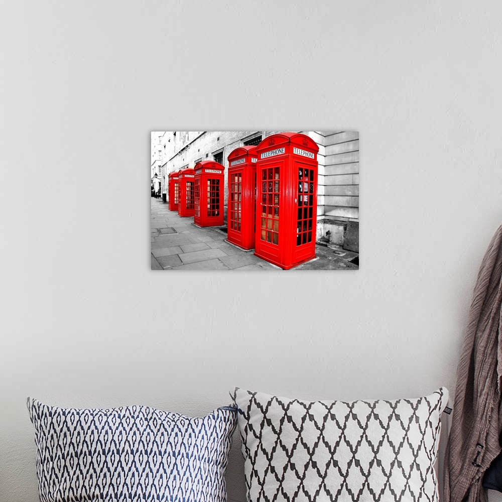 A bohemian room featuring London Telephone Boxes