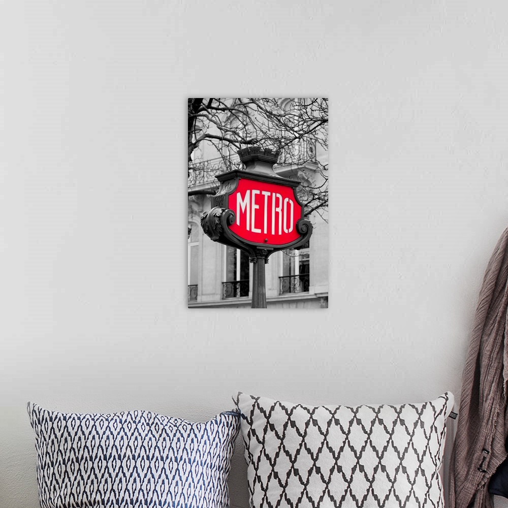 A bohemian room featuring Metro sign for subway transportation in Paris, France.