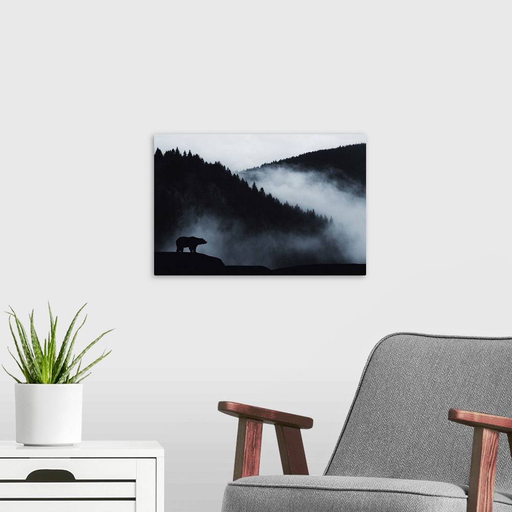 A modern room featuring Minimal wilderness landscape with bear silhouette and misty mountains.