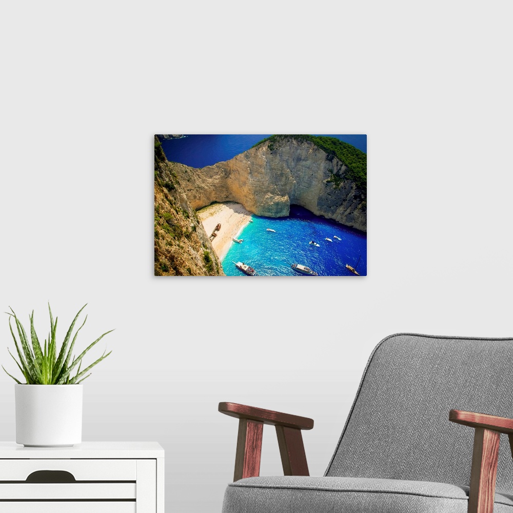 A modern room featuring Aerial view of the most beautiful beach in Zakynthos island - Navagio with shipwreck Greece Ionia...