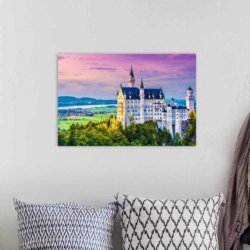 A bohemian room featuring Neuschwanstein Castle in Germany.