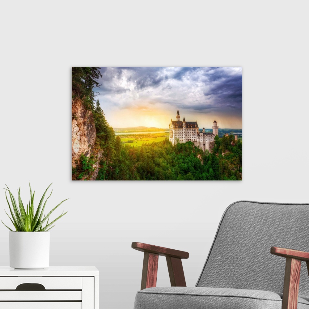 A modern room featuring Neuschwanstein Castle in the Bavarian Alps at sunset, Germany.