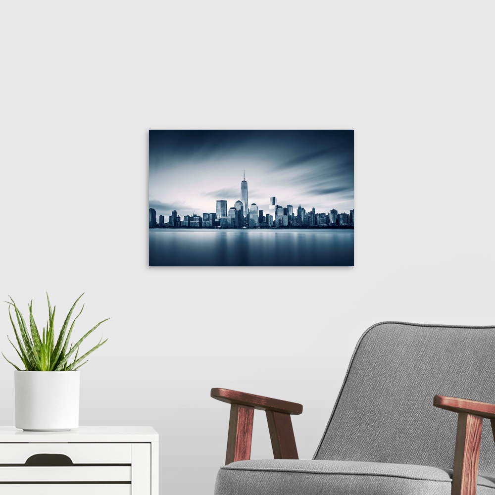 A modern room featuring New York City Lower Manhattan with new One World Trade Center.